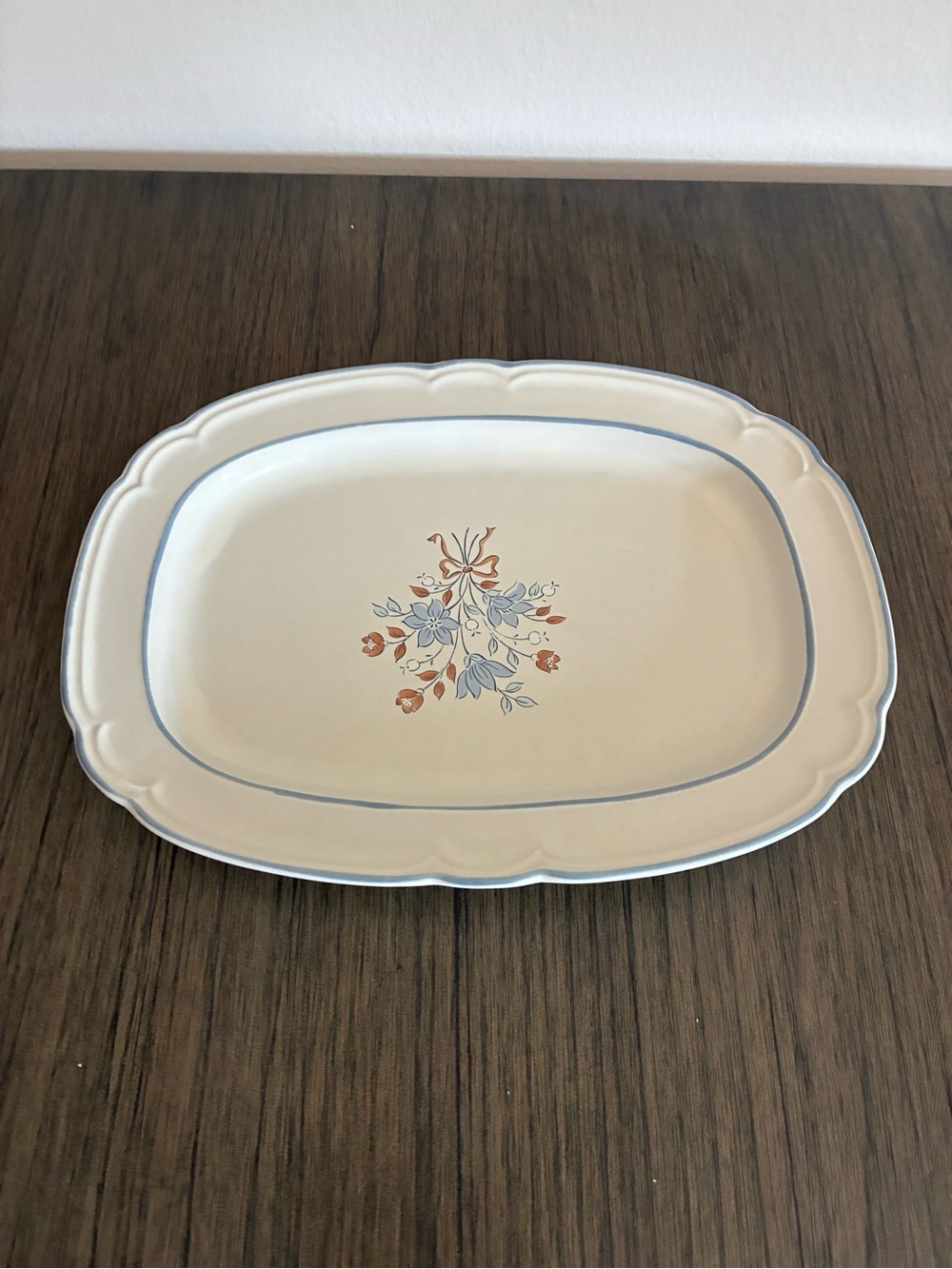 Cream Ceramic Serving Platter with Blue Rim and Orange Floral Accent